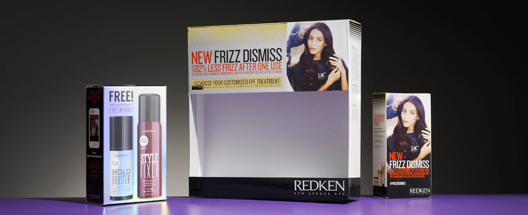 unique display packaging for Redken beauty products
