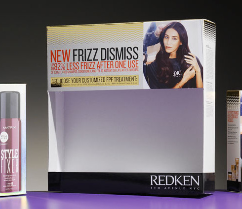 unique display packaging for Redken beauty products